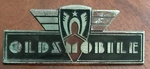 Vintage Original 1937 Oldsmobile Radio Delete Plate Dashboard Emblem Badge. Fixed Price $49.99.