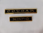 New Repro. 1968 Mercury Cougar XR7-G Dash Emblems Ornament Trim Pair Gold. Fixed Price $79.00.