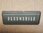 Vintage 1950'S Oldsmobile Radio Delete Plate Gray Background Very Nice!. Fixed Price $21.99.