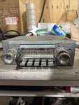 1964 1965 Ford Thunderbird Factory Original Am Radio With Dash Bezel Untested. Fixed Price $50.00.