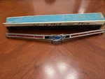 Nos 1965 Chevrolet Impala Header Panel Emblem. Fixed Price $250.00.