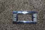 1949 Chrysler Clock Bezel 1295143. Fixed Price $35.00.