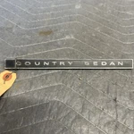 Nos 65 Ford Country Sedan Dash Name Plate Emblem #C5AZ-7104460-A. Fixed Price $38.00.